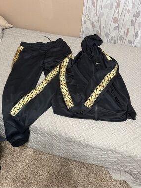 Nike Black Tracksuit with Gold Chain-Print Stripe